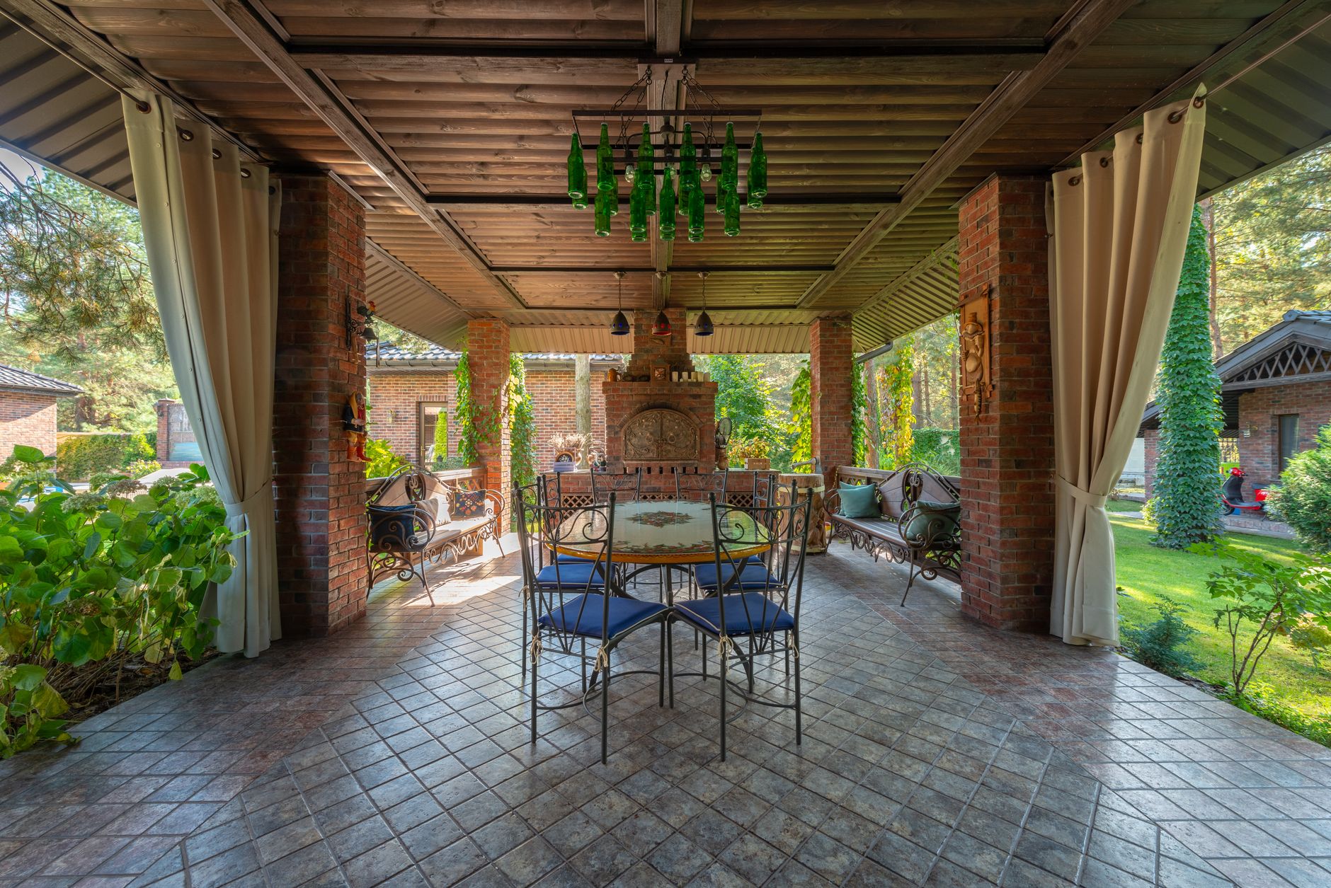Insulated patio cover shading a backyard patio in Metairie