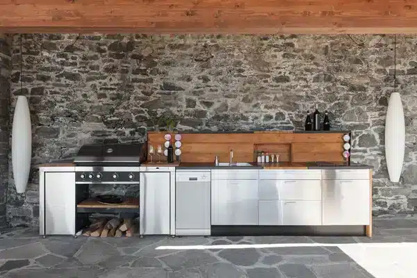 Modern outdoor kitchen built with durable stone and concrete materials