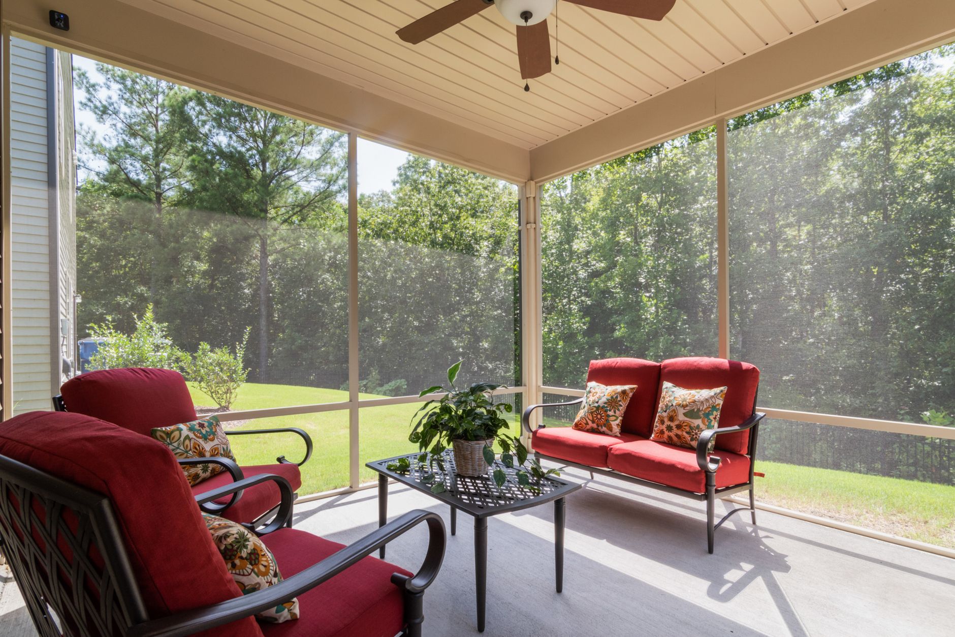 Motorized retractable patio screen on a Metairie patio