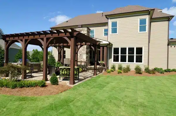 Residential pergola adding shade and curb appeal to a backyard